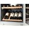 Multi-purpose built in wine cabinet for the storage and service of wine
